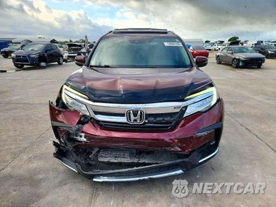 Piąte zdjęcie samochodu w środku: 2021 HONDA PILOT TOURING VIN:5FNYF5H94MB037271 - miniatura