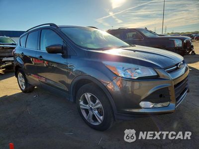 Czwarte zdjęcie samochodu z boku: 2016 FORD ESCAPE SE VIN:1FMCU9GX3GUA88968 - miniatura