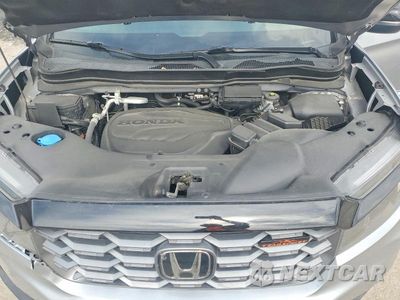 Zdjęcie 11 z 12 samochodu: 2022 HONDA PASSPORT TRAIL SPORT VIN:5FNYF8H68NB026881 - miniatura
