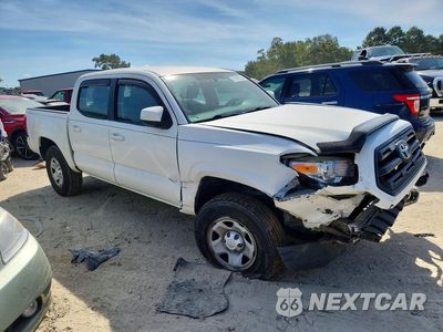 Czwarte zdjęcie samochodu z boku: 2017 TOYOTA TACOMA SR V6 VIN:3TMCZ5AN2HM080047 - miniatura