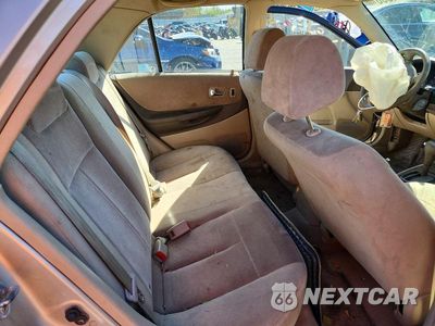 Zdjęcie 10 z 12 samochodu: 2001 MAZDA PROTEGE LX VIN:JM1BJ225110422483 - miniatura