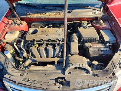 Zdjęcie 11 z 12 samochodu: 2009 KIA OPTIMA LX VIN:KNAGE228995310644 - miniatura