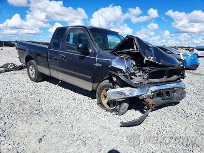 Czwarte zdjęcie samochodu z boku: 2001 FORD F150 VIN:1FTZX17271NB43824 - miniatura