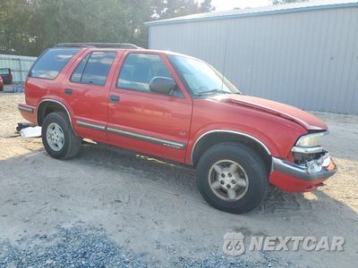 Czwarte zdjęcie samochodu z boku: 1999 CHEVROLET BLAZER VIN:1GNDT13W4X2231827 - miniatura