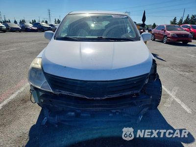 Piąte zdjęcie samochodu w środku: 2010 NISSAN VERSA 1.8 S VIN:3N1BC1CP0AL419570 - miniatura