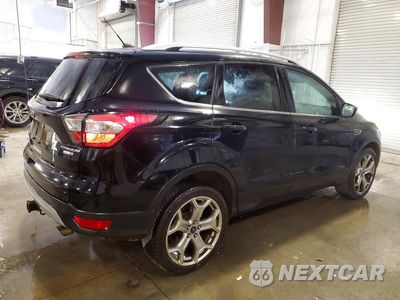 Trzecie zdjęcie samochodu z tyłu: 2017 FORD ESCAPE TITANIUM VIN:1FMCU9J95HUA14625 - miniatura