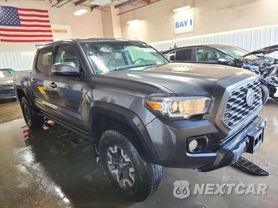 Czwarte zdjęcie samochodu z boku: 2022 TOYOTA TACOMA TRD OFF-ROAD VIN:3TMCZ5AN3NM501558 - miniatura