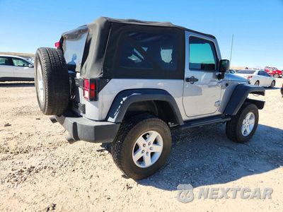 Trzecie zdjęcie samochodu z tyłu: 2016 JEEP WRANGLER SPORT VIN:1C4AJWAG9GL135888 - miniatura