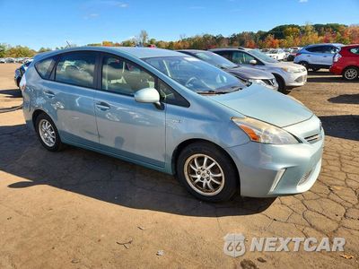 Czwarte zdjęcie samochodu z boku: 2014 TOYOTA PRIUS V THREE VIN:JTDZN3EU6EJ002147 - miniatura