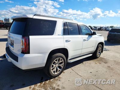 Trzecie zdjęcie samochodu z tyłu: 2015 GMC YUKON SLE VIN:1GKS1AKC9FR140480 - miniatura