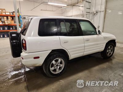 Trzecie zdjęcie samochodu z tyłu: 1999 TOYOTA RAV4 BASE VIN:JT3HP10V4X7121748 - miniatura
