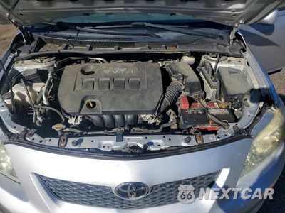 Zdjęcie 11 z 12 samochodu: 2009 TOYOTA COROLLA LE VIN:JTDBL40EX9J018533 - miniatura