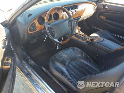 Zdjęcie 8 z 12 samochodu: 2000 JAGUAR XK8 VIN:SAJJA41C1YNA00836 - miniatura