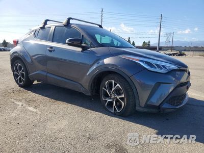 Czwarte zdjęcie samochodu z boku: 2021 TOYOTA C-HR XLE VIN:JTNKHMBX3M1114721 - miniatura