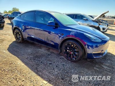Czwarte zdjęcie samochodu z boku: 2022 TESLA MODEL Y VIN:7SAYGDEE3NF543266 - miniatura