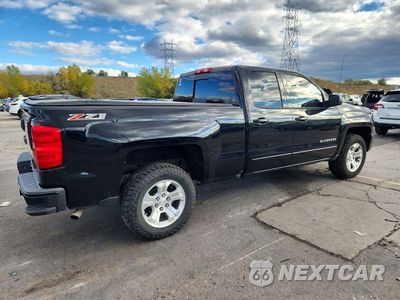 Trzecie zdjęcie samochodu z tyłu: 2017 CHEVROLET SILVERADO K1500 LT VIN:1GCVKRECXHZ126820 - miniatura