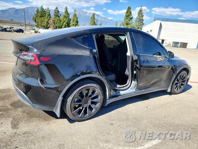 Trzecie zdjęcie samochodu z tyłu: 2022 TESLA MODEL Y VIN:7SAYGDEE6NF458342 - miniatura