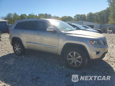 Czwarte zdjęcie samochodu z boku: 2015 JEEP GRAND CHEROKEE LAREDO VIN:1C4RJFAG5FC133802 - miniatura