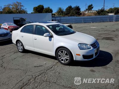 Czwarte zdjęcie samochodu z boku: 2010 VOLKSWAGEN JETTA SE VIN:3VWRZ7AJ4AM168264 - miniatura
