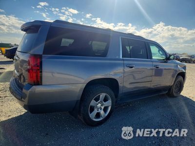 Trzecie zdjęcie samochodu z tyłu: 2018 CHEVROLET SUBURBAN K1500 LT VIN:1GNSKHKC1JR182191 - miniatura