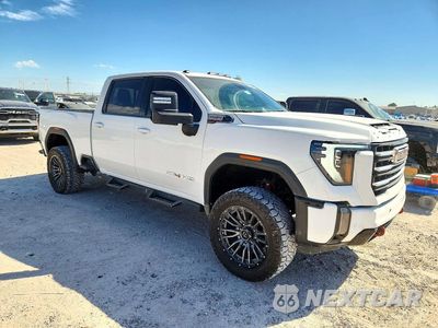 Czwarte zdjęcie samochodu z boku: 2024 GMC SIERRA K2500 AT4 VIN:1GT49PEY1RF332988 - miniatura