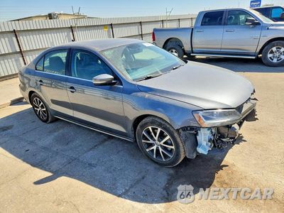 Czwarte zdjęcie samochodu z boku: 2017 VOLKSWAGEN JETTA SE VIN:3VWDB7AJ5HM291788 - miniatura