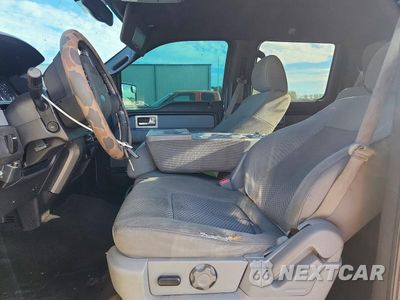 Zdjęcie 7 z 13 samochodu: 2011 FORD F150 SUPERCREW VIN:1FTFW1CFXBFC51400 - miniatura
