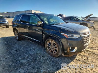 Czwarte zdjęcie samochodu z boku: 2018 CHEVROLET TRAVERSE PREMIER VIN:1GNEVJKW8JJ212436 - miniatura