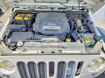 Zdjęcie 12 z 13 samochodu: 2014 JEEP WRANGLER UNLIMITED SAHARA VIN:1C4BJWEG0EL206987 - miniatura