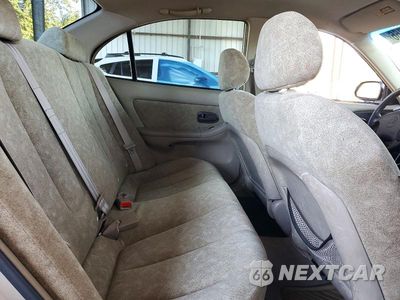 Zdjęcie 10 z 12 samochodu: 2001 HYUNDAI ELANTRA GLS VIN:KMHDN45D91U131312 - miniatura