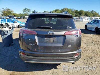 Zdjęcie 6 z 13 samochodu: 2017 TOYOTA RAV4 XLE VIN:JTMRFREV9HJ166750 - miniatura