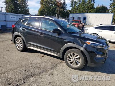 Czwarte zdjęcie samochodu z boku: 2017 HYUNDAI TUCSON SE VIN:KM8J3CA49HU413730 - miniatura