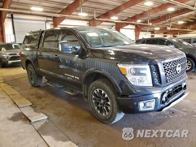 Czwarte zdjęcie samochodu z boku: 2019 NISSAN TITAN PRO-4X VIN:1N6AA1E54KN517994 - miniatura