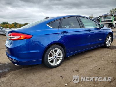 Trzecie zdjęcie samochodu z tyłu: 2018 FORD FUSION S HYBRID VIN:3FA6P0UU1JR122926 - miniatura