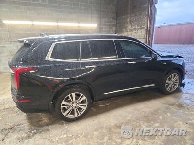 Trzecie zdjęcie samochodu z tyłu: 2024 CADILLAC XT6 PLATINUM PREMIUM LUXURY VIN:1GYKPERS0RZ749874 - miniatura