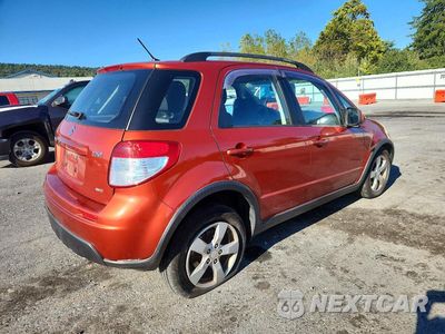 Trzecie zdjęcie samochodu z tyłu: 2012 SUZUKI SX4 VIN:JS2YB5A31C6303489 - miniatura