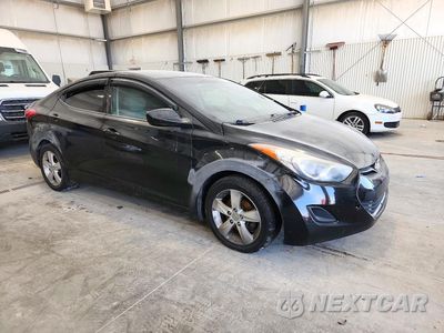 Czwarte zdjęcie samochodu z boku: 2013 HYUNDAI ELANTRA GLS VIN:5NPDH4AE0DH384351 - miniatura