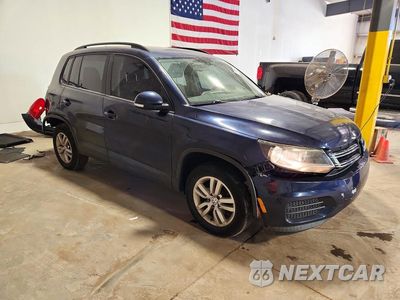 Czwarte zdjęcie samochodu z boku: 2016 VOLKSWAGEN TIGUAN S VIN:WVGBV7AXXGW599135 - miniatura