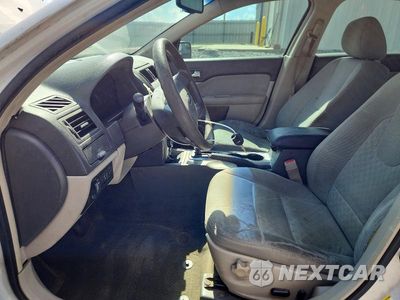 Zdjęcie 7 z 12 samochodu: 2011 FORD FUSION SE VIN:3FAHP0HAXBR344603 - miniatura