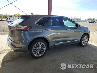 Trzecie zdjęcie samochodu z tyłu: 2022 FORD EDGE TITANIUM VIN:2FMPK4K91NBA70393 - miniatura
