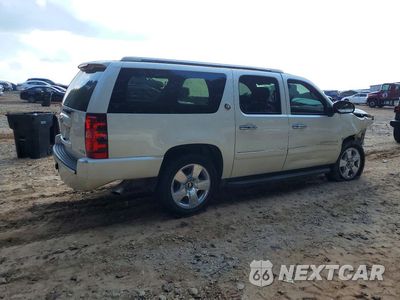 Trzecie zdjęcie samochodu z tyłu: 2010 CHEVROLET SUBURBAN VIN:1GNUCKE00AR283243 - miniatura
