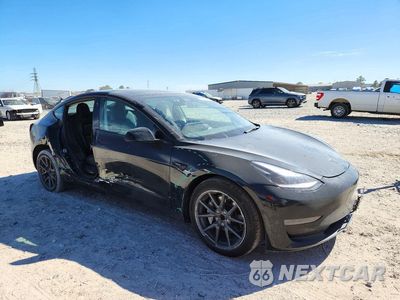 Czwarte zdjęcie samochodu z boku: 2022 TESLA MODEL 3 VIN:5YJ3E1EAXNF286647 - miniatura