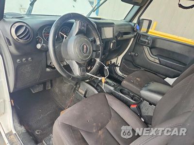 Zdjęcie 8 z 13 samochodu: 2017 JEEP WRANGLER SPORT VIN:1C4AJWAG9HL582576 - miniatura