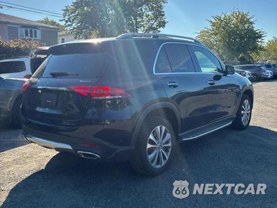 Czwarte zdjęcie samochodu z boku: 2021 MERCEDES-BENZ GLE 450 4MATIC VIN:4JGFB5KB7MA497141 - miniatura