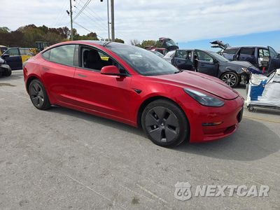 Czwarte zdjęcie samochodu z boku: 2022 TESLA MODEL 3 VIN:5YJ3E1EA7NF370361 - miniatura