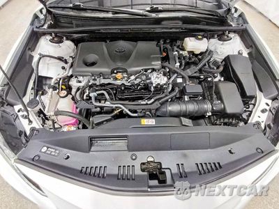 Zdjęcie 11 z 12 samochodu: 2023 TOYOTA CAMRY HYBRID LE VIN:4T1C31AKXPU055211 - miniatura