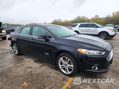 Czwarte zdjęcie samochodu z boku: 2016 FORD FUSION TITANIUM PHEV VIN:3FA6P0SU3GR121627 - miniatura