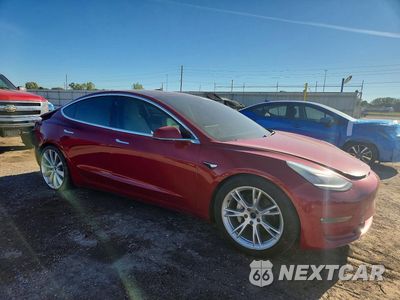 Czwarte zdjęcie samochodu z boku: 2018 TESLA MODEL 3 VIN:5YJ3E1EB6JF111797 - miniatura