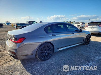 Trzecie zdjęcie samochodu z tyłu: 2022 BMW 740 I VIN:WBA7T2C04NCJ65324 - miniatura