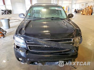 Piąte zdjęcie samochodu w środku: 2011 CHEVROLET SUBURBAN C1500 LT VIN:1GNSCJE05BR294421 - miniatura